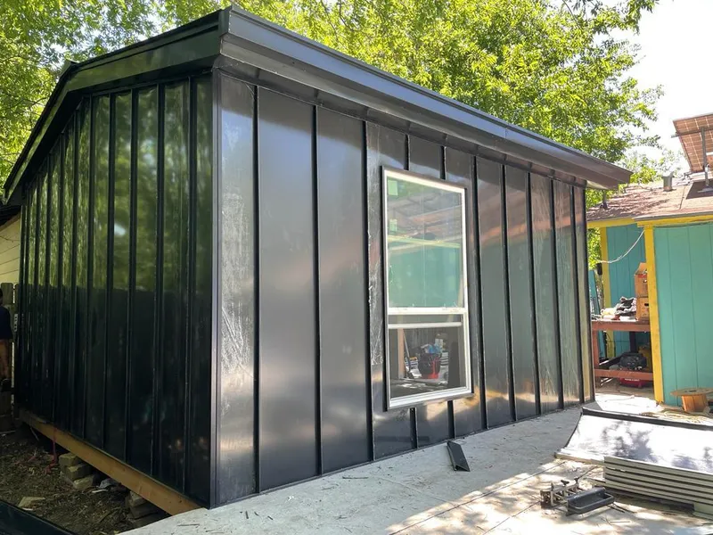 Black standing seam metal wall panels for Metal Roof Installation in Columbia Heights
