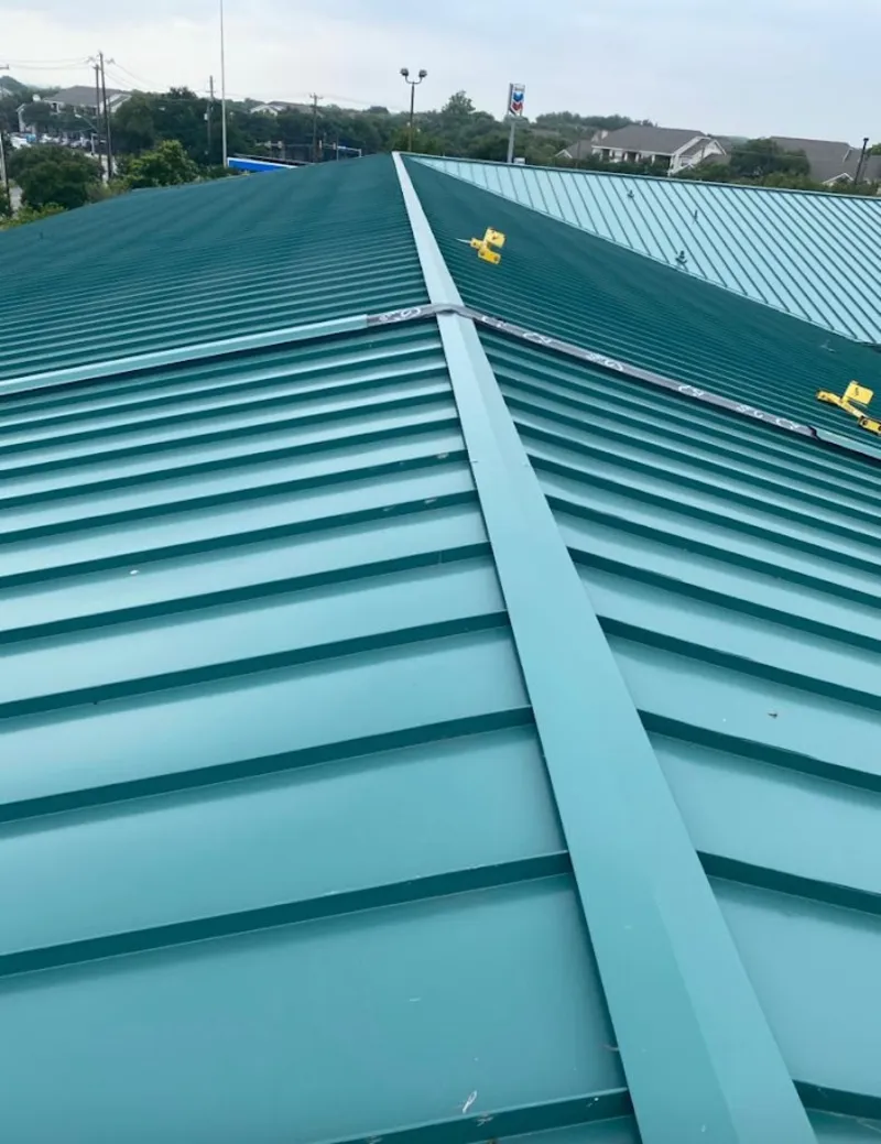 Green commercial metal roof ridge and valley for Metal Roof Repair in Columbia Heights